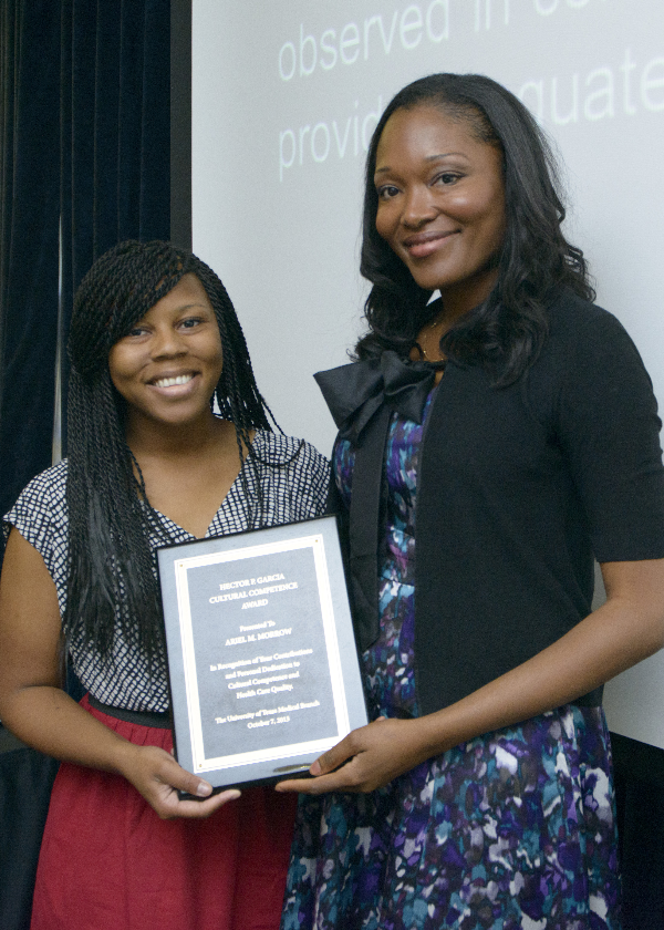 Award winner, Ariel M. Morrow and Adeola Oduwole, director of UTMB Diversity & Inclusion.