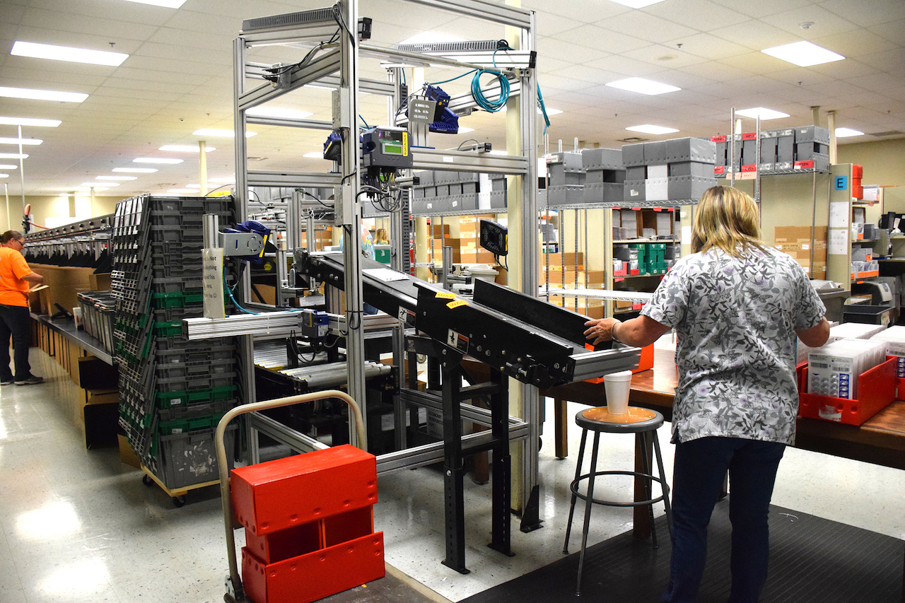 State-of-the-art automated devices sort medications at high speed at UTMB CMC’s central pharmacy in Huntsville.