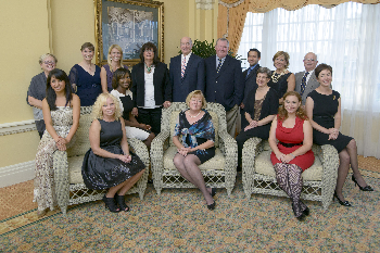 The 2013 award winners are, seated from left, Roxanne Radi, medical student; Rebecca L. Trout, executive director for community relations; Dr. Tuere Coulter, assistant professor, family medicine; Nancy Schultz, executive director of the Galveston Children’s Museum; Dr. Juliet McKee, assistant professor, family medicine; Julie Kutac, doctoral candidate, Institute for Medical Humanities; and Gisele A. Lombard, senior lung transplant coordinator.  Standing, from left, Dr. Cheryl S. Watson, professor, department of biochemistry and molecular biology; Dr. Vicki Freeman, President’s Cabinet awards committee chair; Dr. Meredith Masel, program manager, Oliver Center; Ellen Adriance, applications system analyst; UTMB President, Dr. David L. Callender; Dr. William Mileski, chief, trauma surgery; David Gersztenkorn, medical student; Ann Masel, President’s Cabinet chair; and Dr. John Fraser, professor, department of preventive medicine and community health.