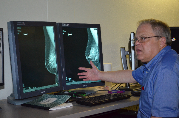 UTMB Director of Breast Imaging Dr. Morton Leonard explains a procedure he uses to biopsy a lump in the breast.