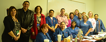 EAC representatives Craig Kovacevich (black jacket) and Michele Lockwood (red jacket) met with nursing triage staff at the Clear Lake Access Center office February 6th for an “Engage and Chat."
