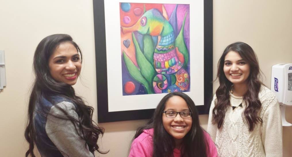 Shanika Silva with volunteers Makaela Toliver and Fatimah Sayeed