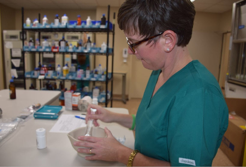 Carr creates a personalized medication for a patient.