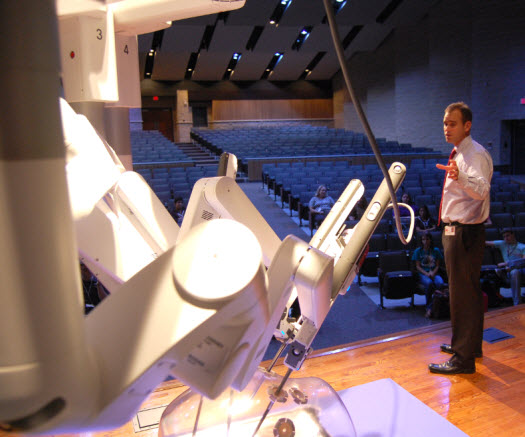 Dr. Joseph Sonstein, director of Minimally Invasive Urology at UTMB, speaks at Angleton High School about robotic-assisted surgery.