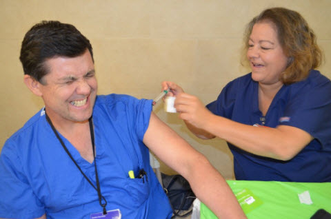 Sandra Chambers, LVN, and Dr. Chris Marquez, Pathology (who plays it up for the camera!)