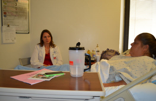 Dr. Sonstein checking on patient Katherine Allen