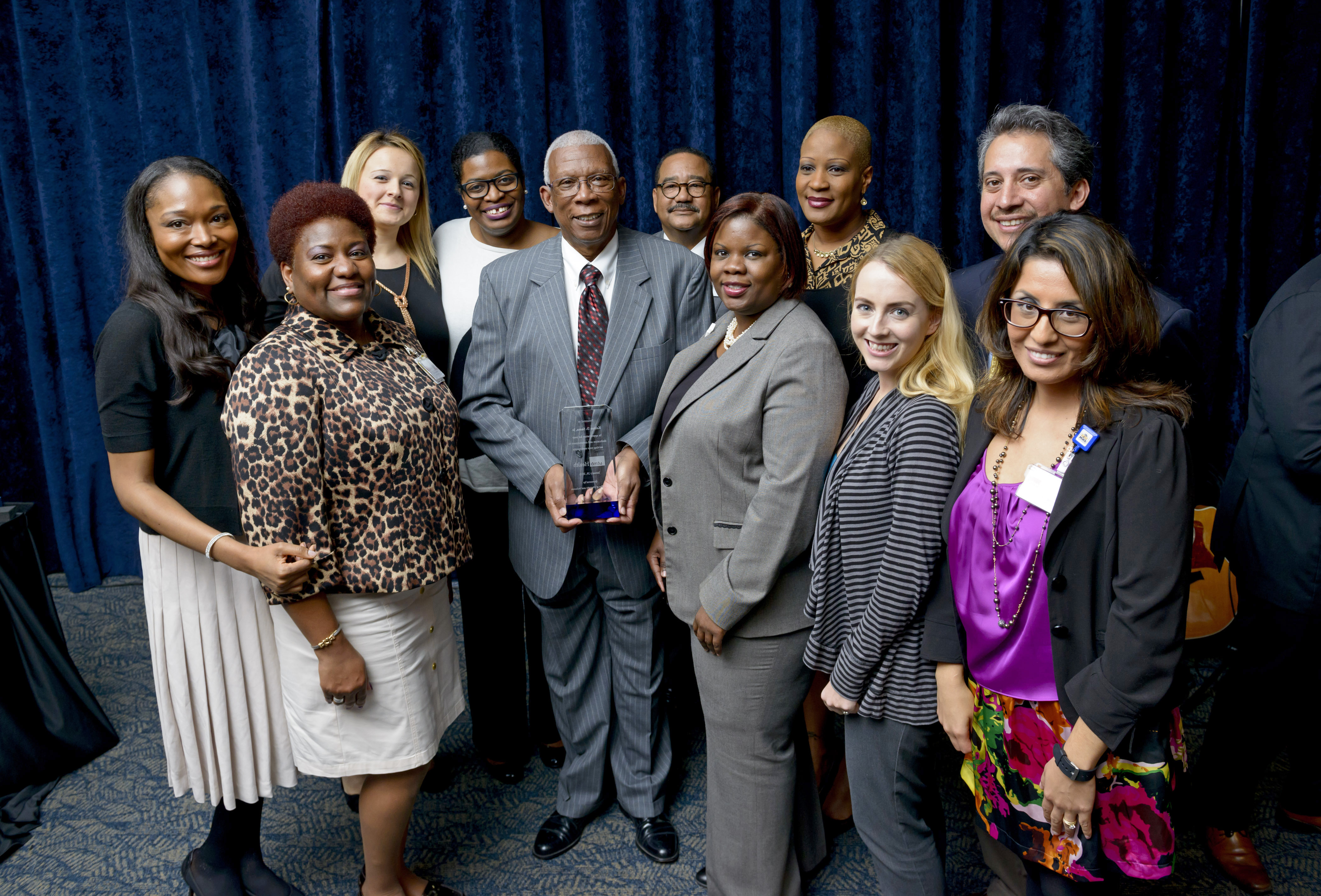 Kelton D. Sams (center) with MLK award program committee members