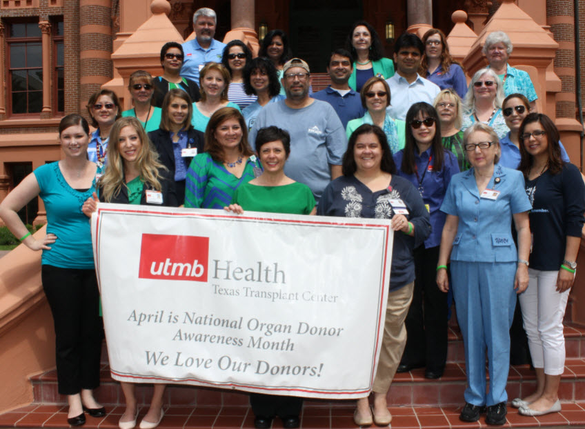 Members of the Texas Transplant Center showing their support on National Donate Life Blue & Green Day