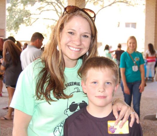 Yesenia Sandino, assistant nursing manager in the Infant Special Care Unit, and one of her former patients, 8-year-old Nathan Childress.