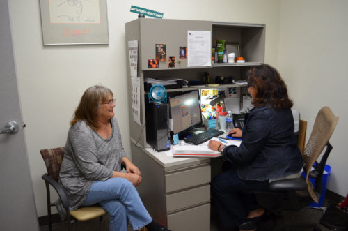 Barrera-Kovach helps patient Rita West get medical equipment