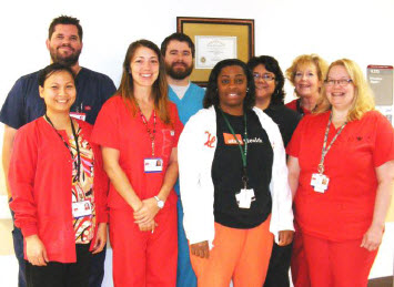 UTMB staff: (Front) Khanh Nguyen, Christi Glasen-Moore, Andrea Flowers, Shanna Perrone. (Back) Wes Borger, Joseph Pieper, Alicia King, Jeanne Patton