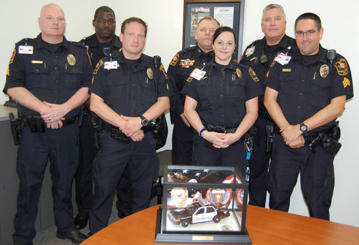Some of the UTMB police staff members with the Pacesetter Award are, from left, Sgt. Noel Layer, Sgt. Oliver Scott, Sgt. Shawn Carr, Chief Thomas Engells, Officer Laura Barret, Officer James Carr and Sgt. James Price.