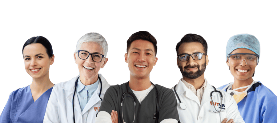 Five healthcare professionals smiling shoulder-to-shoulder together.