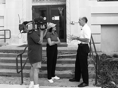 UTMB Response to Hurricane Ike UTMB President Dr. David Callender speaks with a television news crew after Hurricane Ike in 2008.