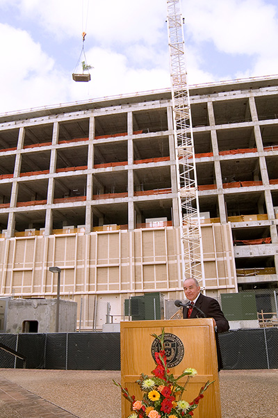 Galveston National Laboratory Construction A speaker stands at a podium during construction of the Galveston National Laboratory at UTMB.