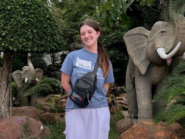 SPPH MPH Student, Allie Murphy, standing in Elephant Mountain.