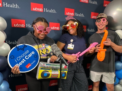 bc7 Image of three people with props