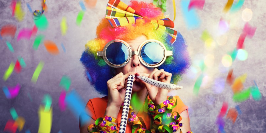 Image of child with party gear