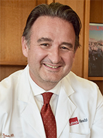 Professional headshot of male doctor