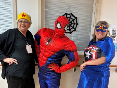 Image of people dressed as Spiderman