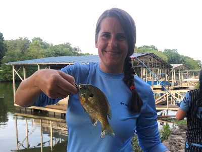 Photo of woman holding fish