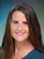 Professional headshot of woman with long dark hair