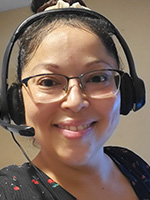 Headshot of woman with headphones