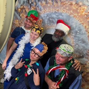 Image of group in Christmas hats