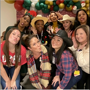 Group photo of people clowning for the camera