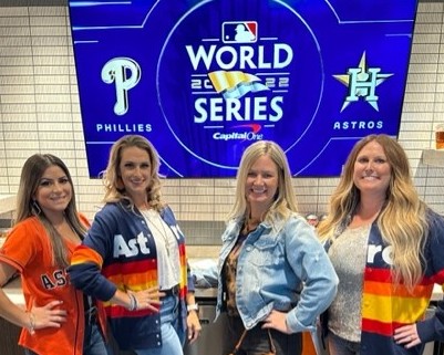 Four women in Astros gear