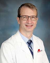 Dr. Mitchell Cox, MD