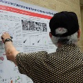 attendee with poster