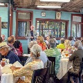 Craig Brown, AmeriCorps volunteer, speaks at annual luncheon