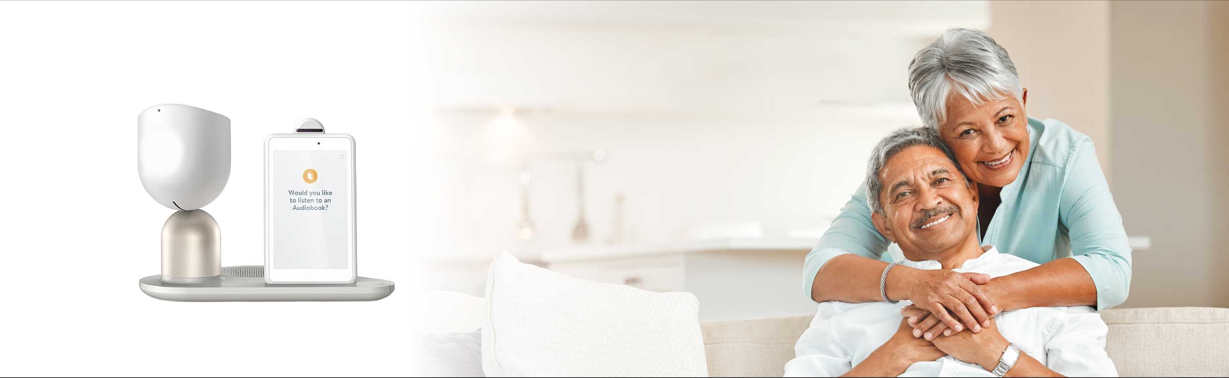 robot companion and older adult woman with older adult man in a home setting