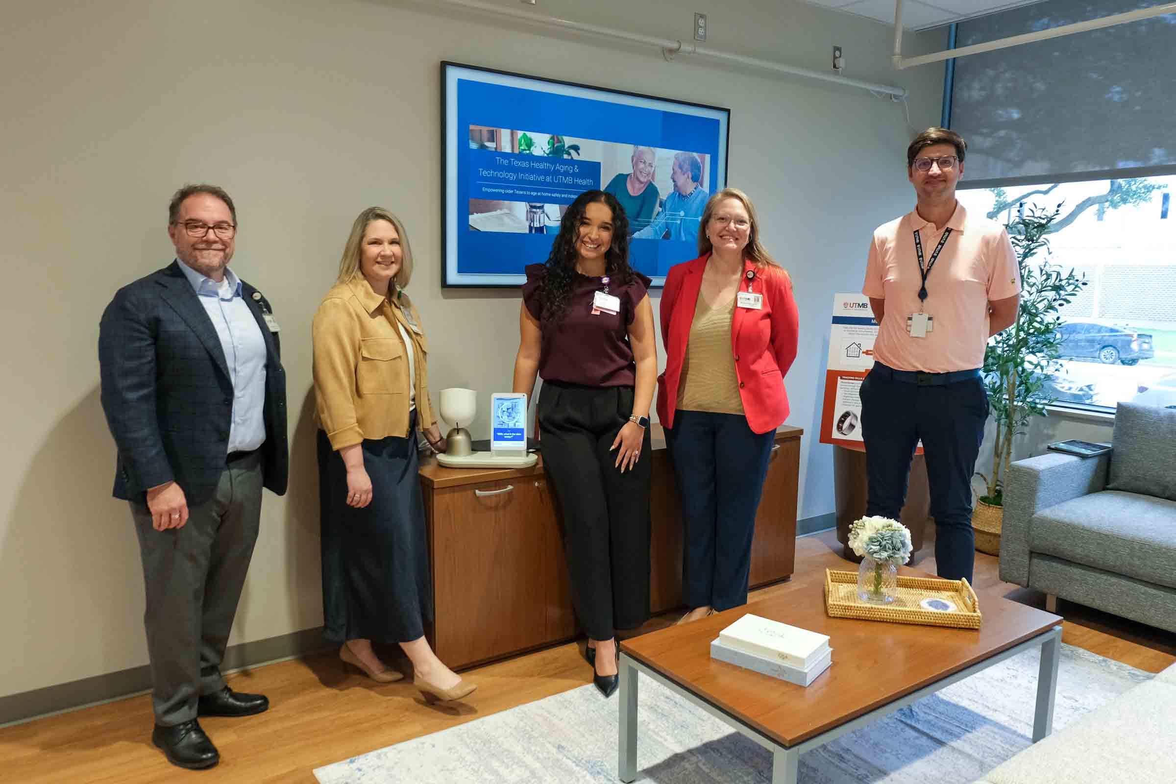 photo of diverse group of researchers in an instrumented home setting