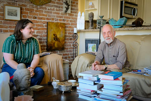 Ulli Budelmann a medical student interviews an older adult in his home