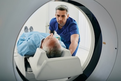 older man receiving an MRI