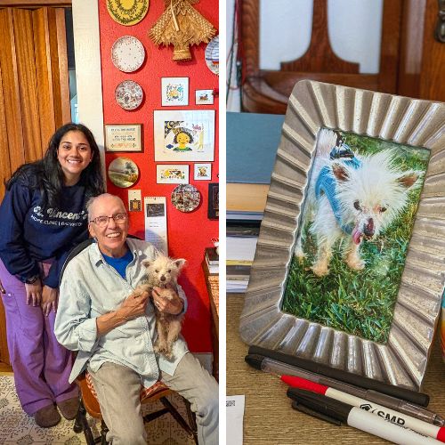 A medical student, (Arati Bendapudi) poses with older adult, (Bets Anderson) and her pet dog in her home; Framed tabletop photo of a small, elderly, shaggy white dog–Bets Anderson’s pet