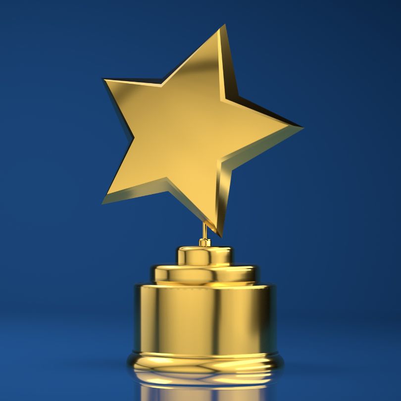 trophy with star on blue background
