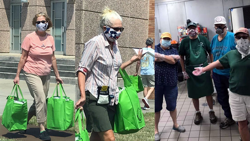 photo of men and women volunteering, carrying bags of food, wearing masks