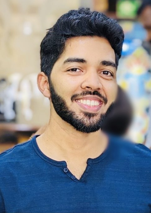 photo of man smiling at camera