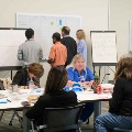 faculty and staff discussing research