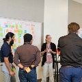 faculty and staff discussing research
