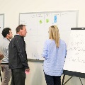 faculty and staff discussing research