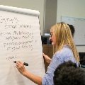 Dr Lantz writes on board