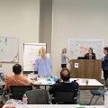 faculty and staff discussing research