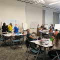 faculty and staff discussing research
