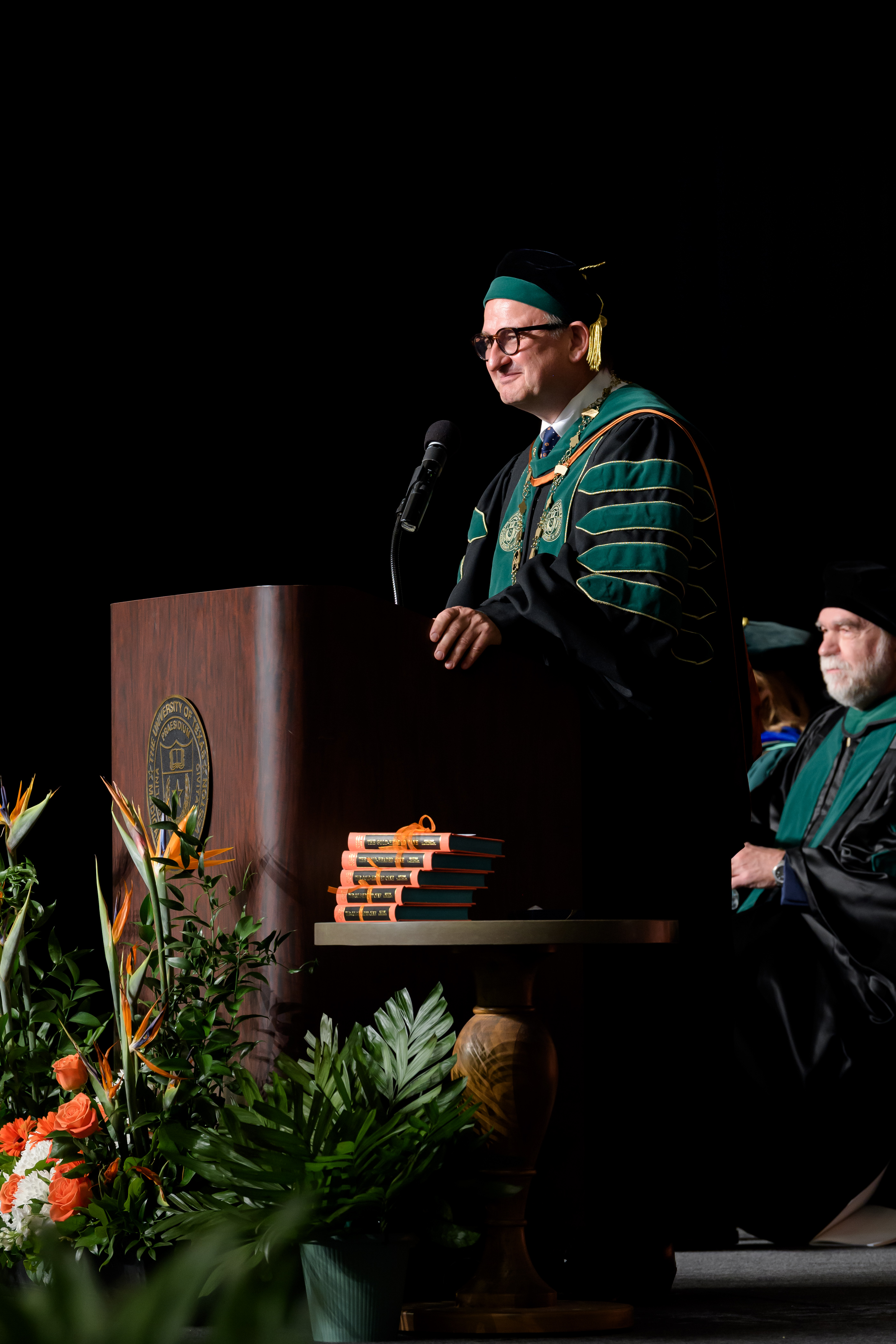 Dr. Reiser delivering a speech during the 2026 JSSOM MD Commencement