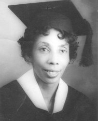 African American woman in cap and gown, headshot.
