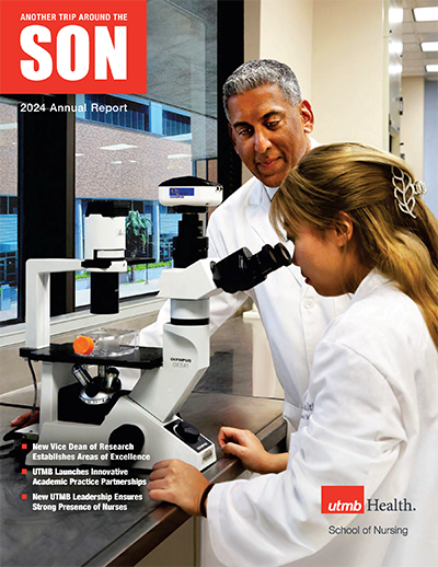 A report cover that shows Dr. Patel with a student looking into a microscope